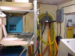 Heated Hose installed on hose rack in mobile spray foam rig.